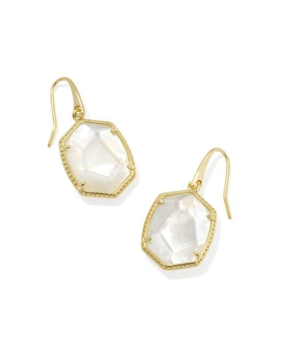 Daphne gold frame drop earrings with carved stones and hoofprint detailing on earwire closure.