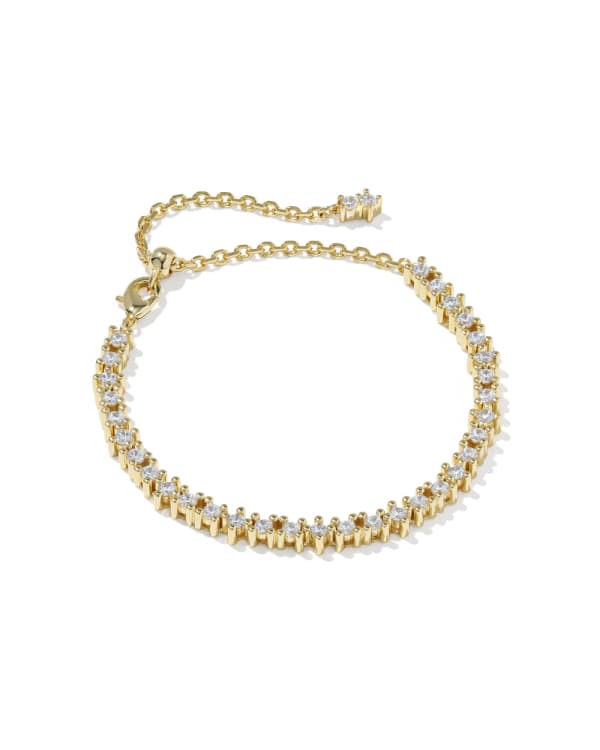 Fate Tennis Bracelet in gold with white cubic zirconia stones and an adjustable chain closure.