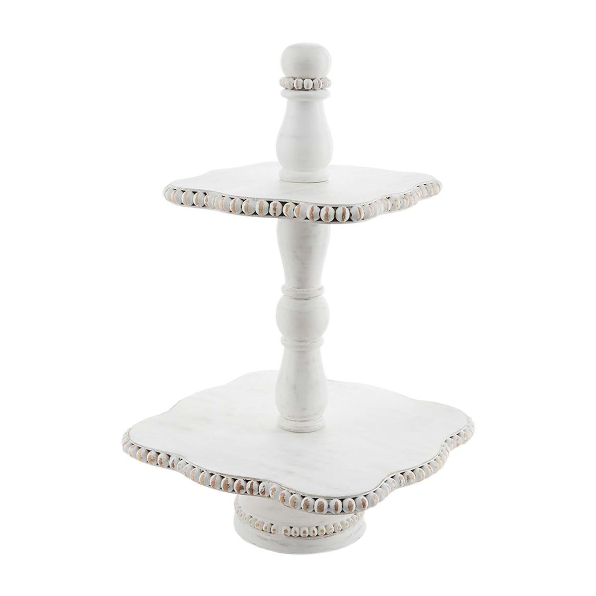 White beaded tiered server made from mango wood with a rectangular silhouette.