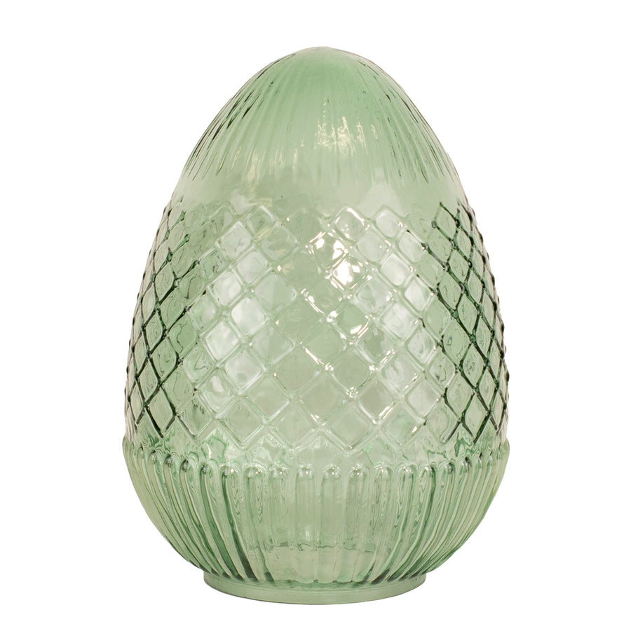 Handcrafted glass egg with vivid hue and intricate surface details.