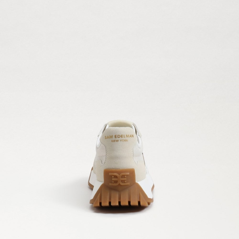Langley lace-up sneaker in custom-dyed leather with fabric accents and rounded toe.