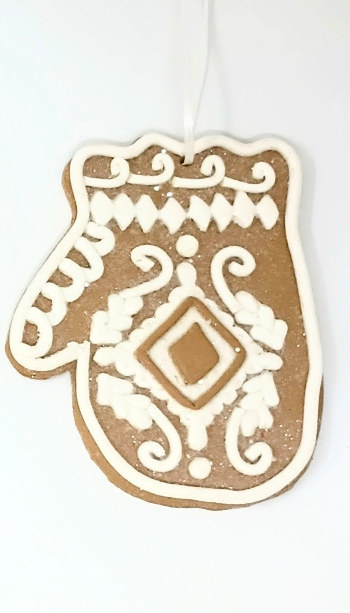 4.75-inch gingerbread man clay dough ornament with a classic silhouette.