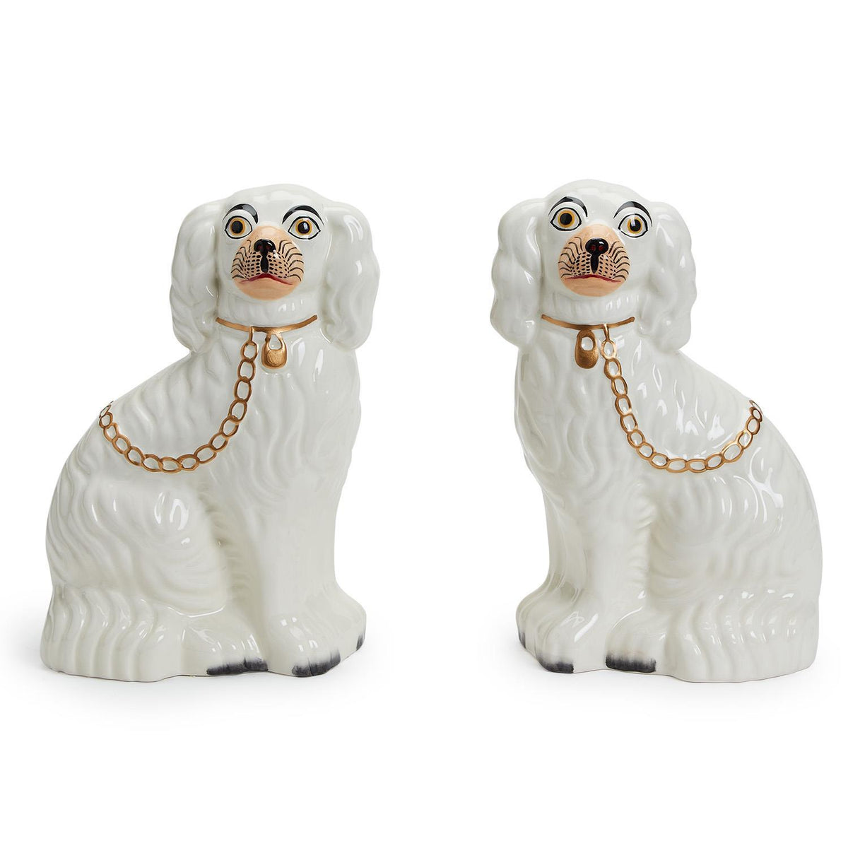 White ceramic Staffordshire dog statue with a classic silhouette.
