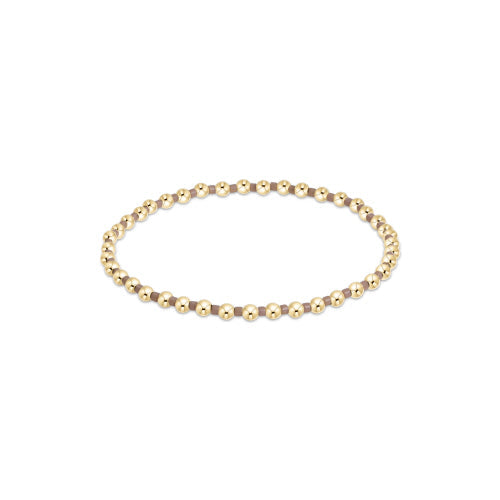 Hope Grateful bracelet featuring mixed 2mm seed beads in spring colors with gold-filled accents on elastic cord.