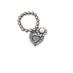 Chunky stretch bracelet with a metal heart charm and rhinestone flower pendant