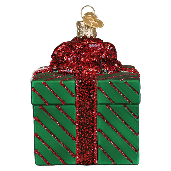 Junk In The Box ornament featuring a whimsical junk pile silhouette with mixed metal textures and earthy tones.