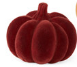 A single 2.75 inch burgundy flocked resin pumpkin with a textured velvet-like finish.