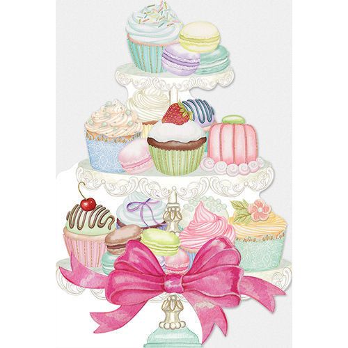 Tiered stand with cupcakes and macarons, decorated with a pink bow.