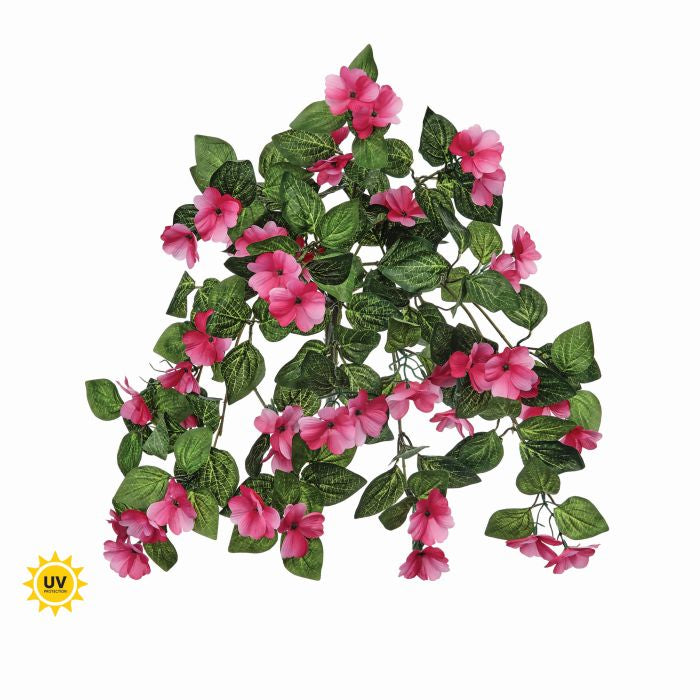 Hanging artificial impatiens plant with realistic blooms in a UV-resistant planter.