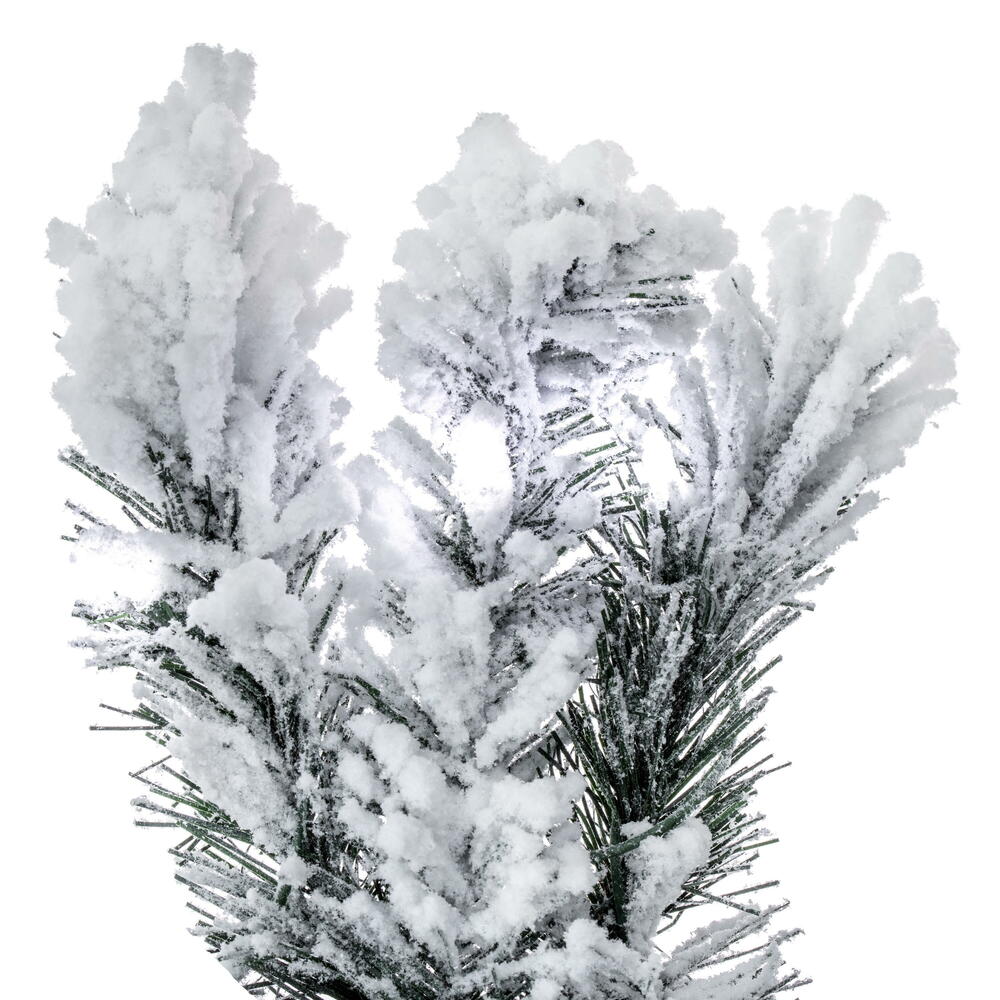 Close-up of 9' x 16" Flocked Alaskan Garland with heavy artificial snow on green PVC pine needles.