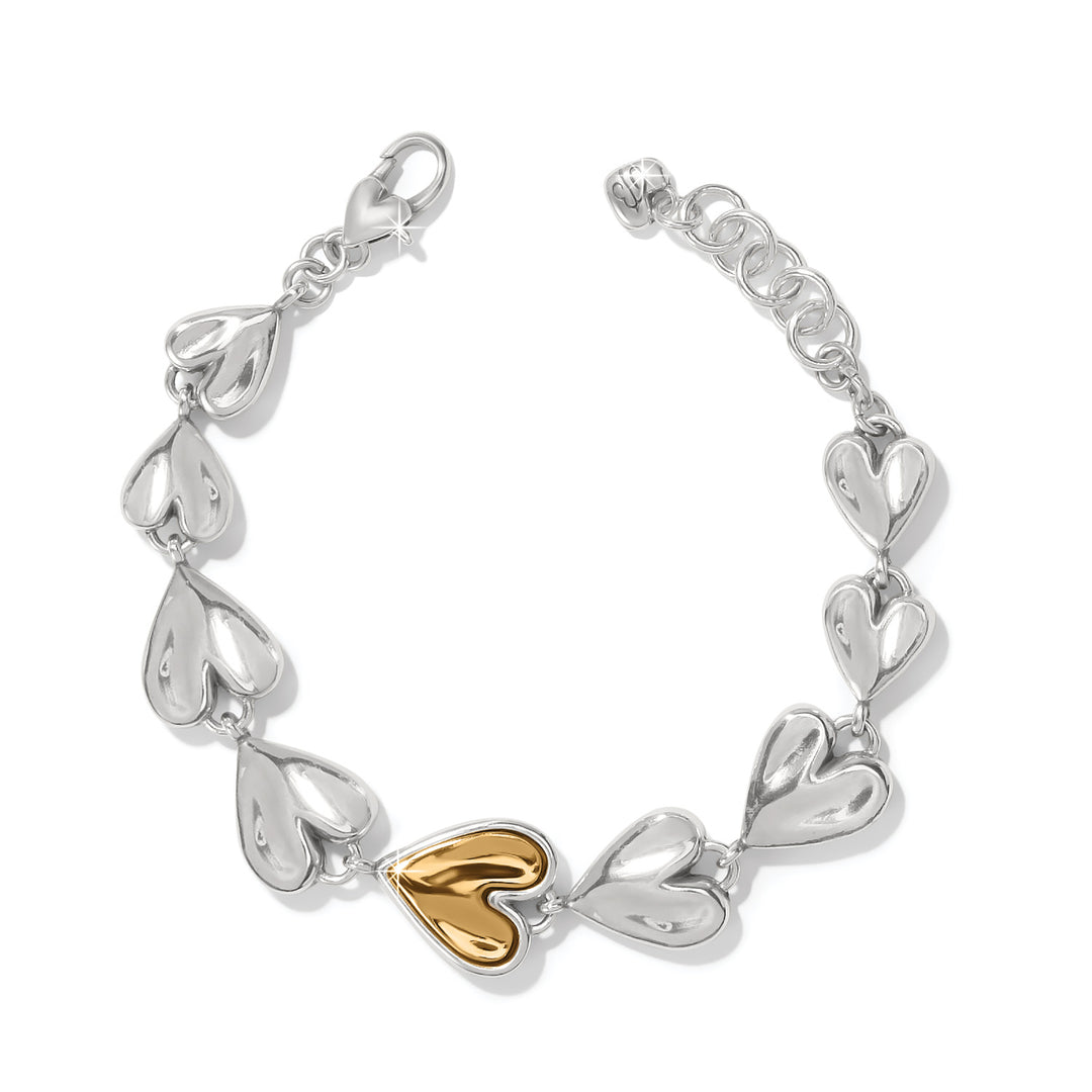 Two-tone silver and gold heart link bracelet with a lobster claw closure and adjustable chain.