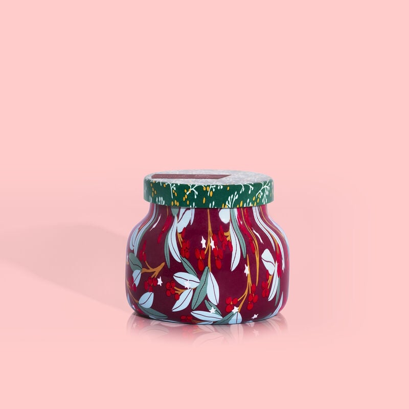 Petite jar candle in Tinsel & Spice scent with a silver tinsel pattern on the glass.
