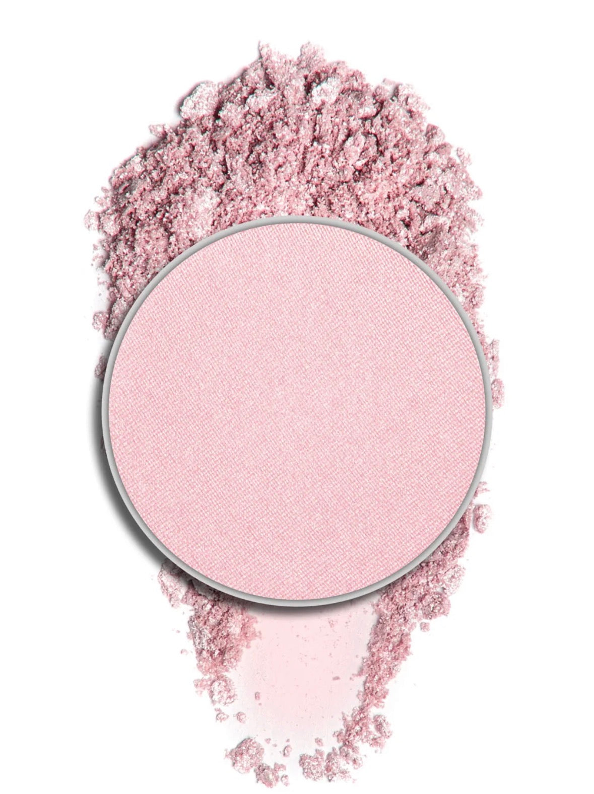 Round pan of shimmering light pink eyeshadow with matching loose powder texture in the background.