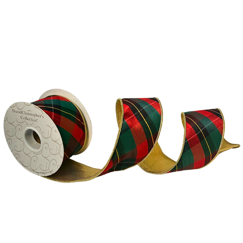 Red, green, and gold plaid ribbon with a nutcracker pattern on a white background