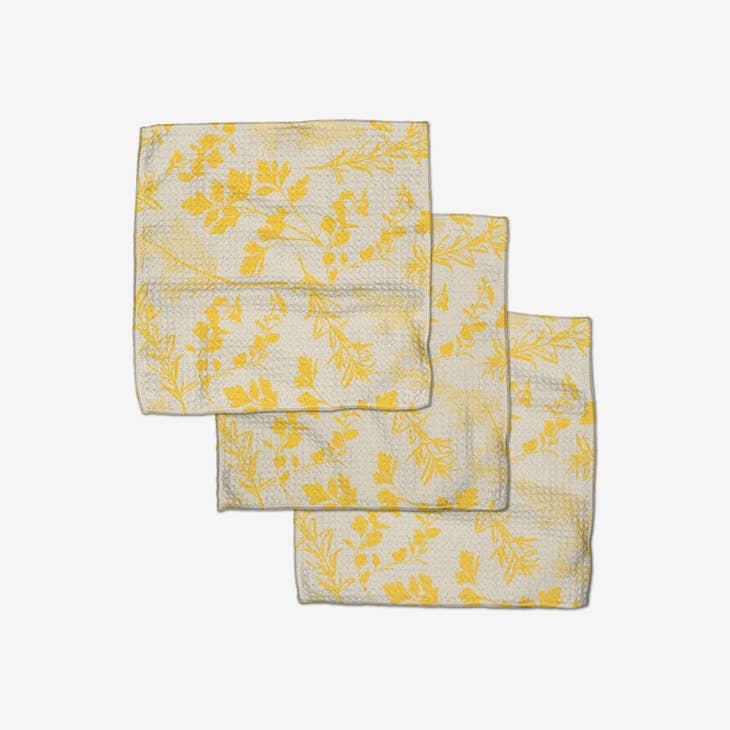 Set of three waffle weave dishcloths in recycled polyester with single-sided prints and hang loops.