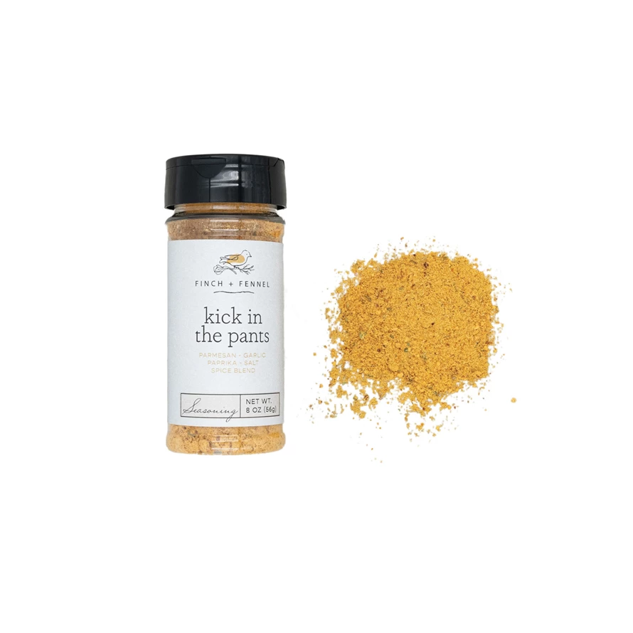 4.3 oz jar of Kick in the Pants Seasoning with fiery chili peppers and zesty peppercorns on label