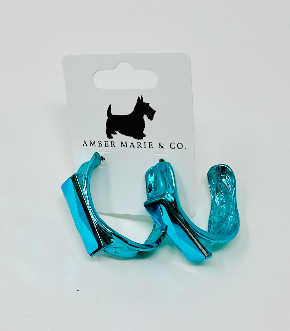 Funky Crystal Color Hoop earrings featuring a vibrant crystal finish in a circular hoop silhouette.