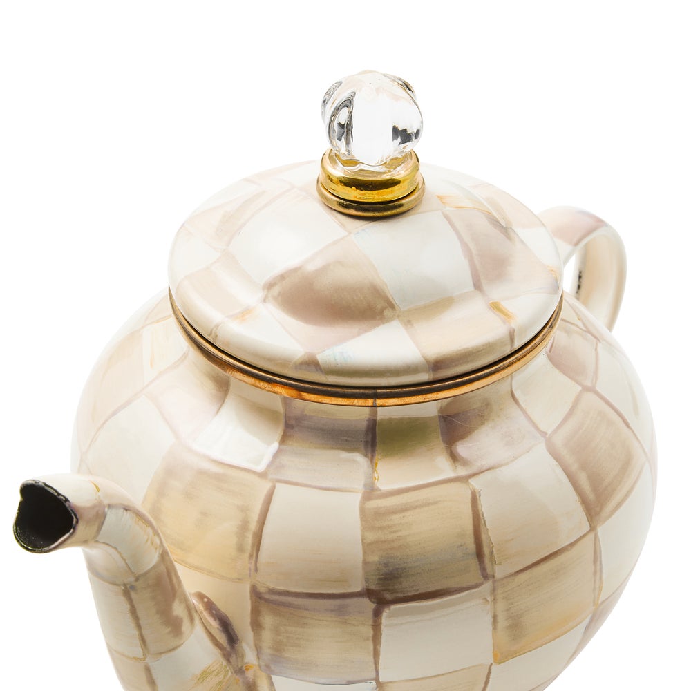 Hand-glazed steel teapot with mocha checkered pattern, bronzed stainless rim, and brass accents.