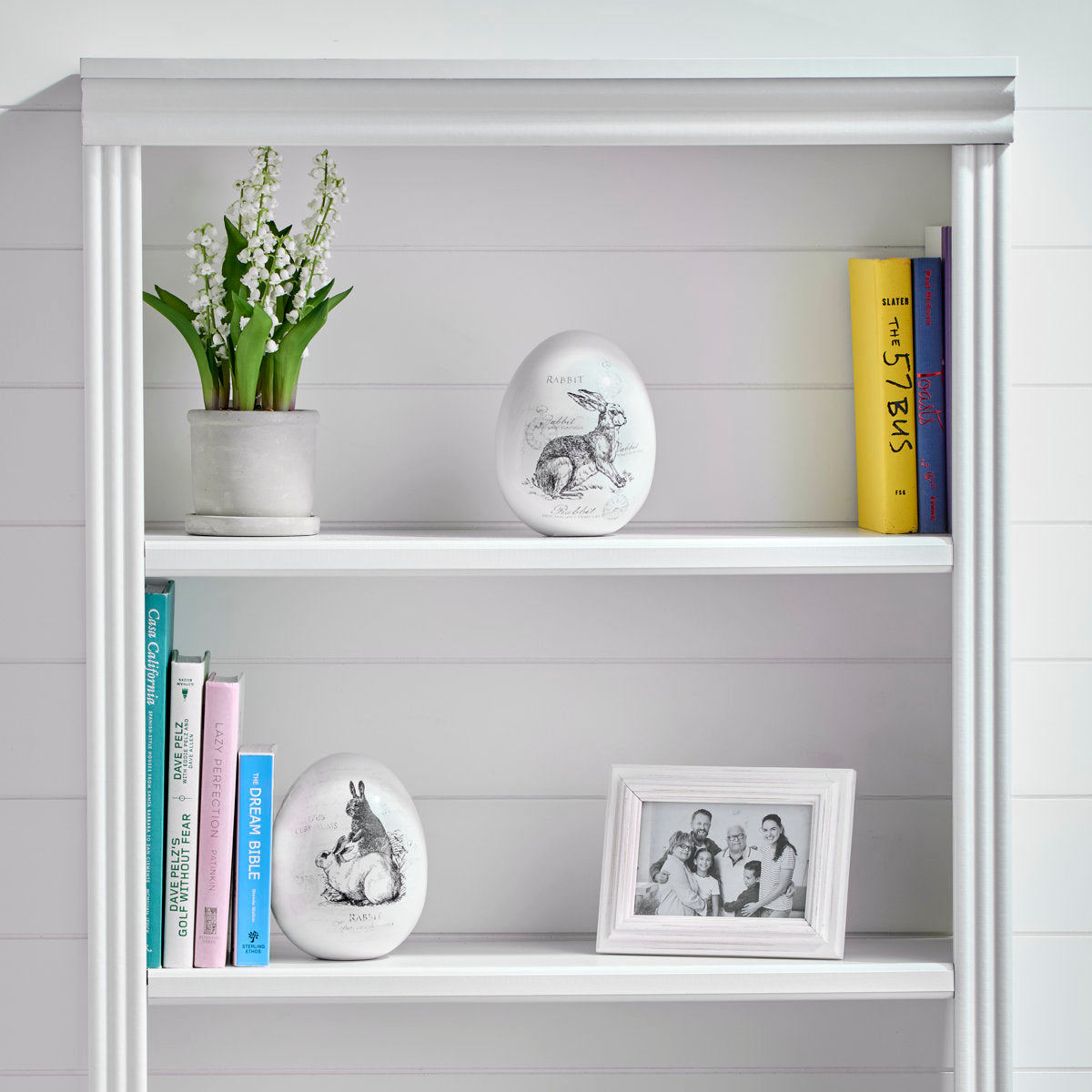 6-inch dolomite resin egg with a white bunny print on a light background