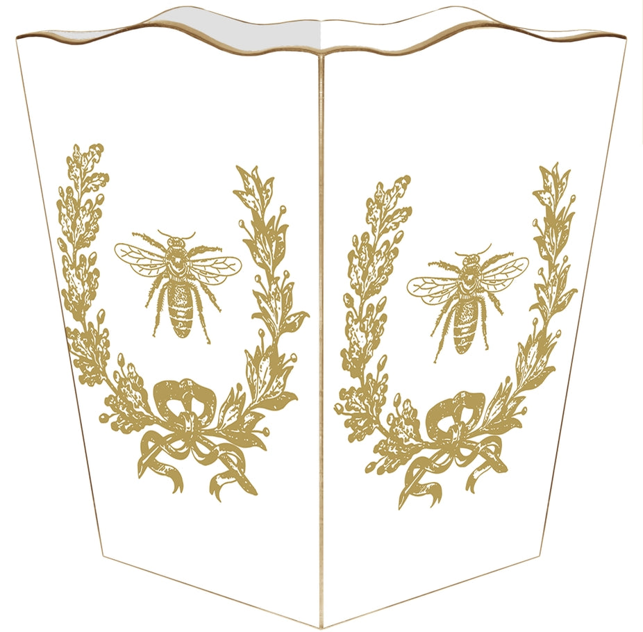 White scalloped wastepaper basket with gold bee and laurel wreath design.