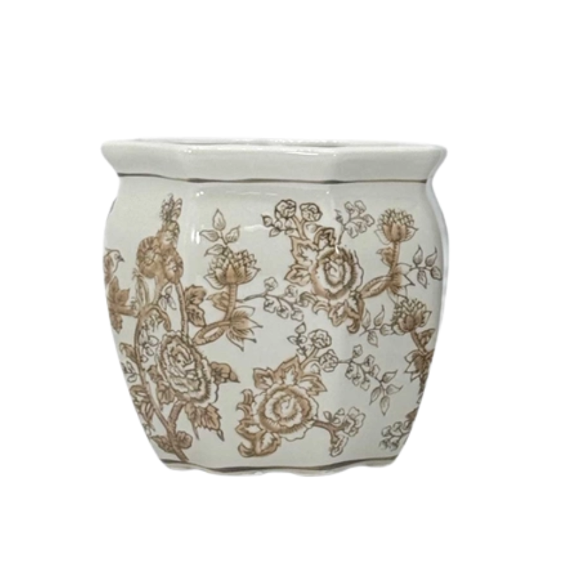 White ceramic planter with brown chinoiserie floral pattern and a scalloped rim.