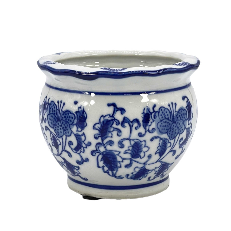 Blue and white floral ceramic pot with ruffled lip