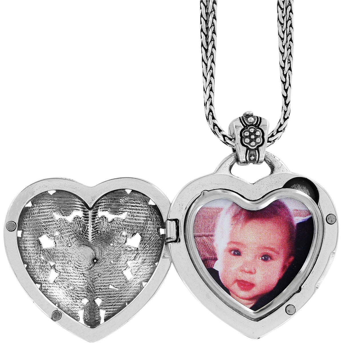 Silver plated locket necklace with a floral heart pendant holding one photo.