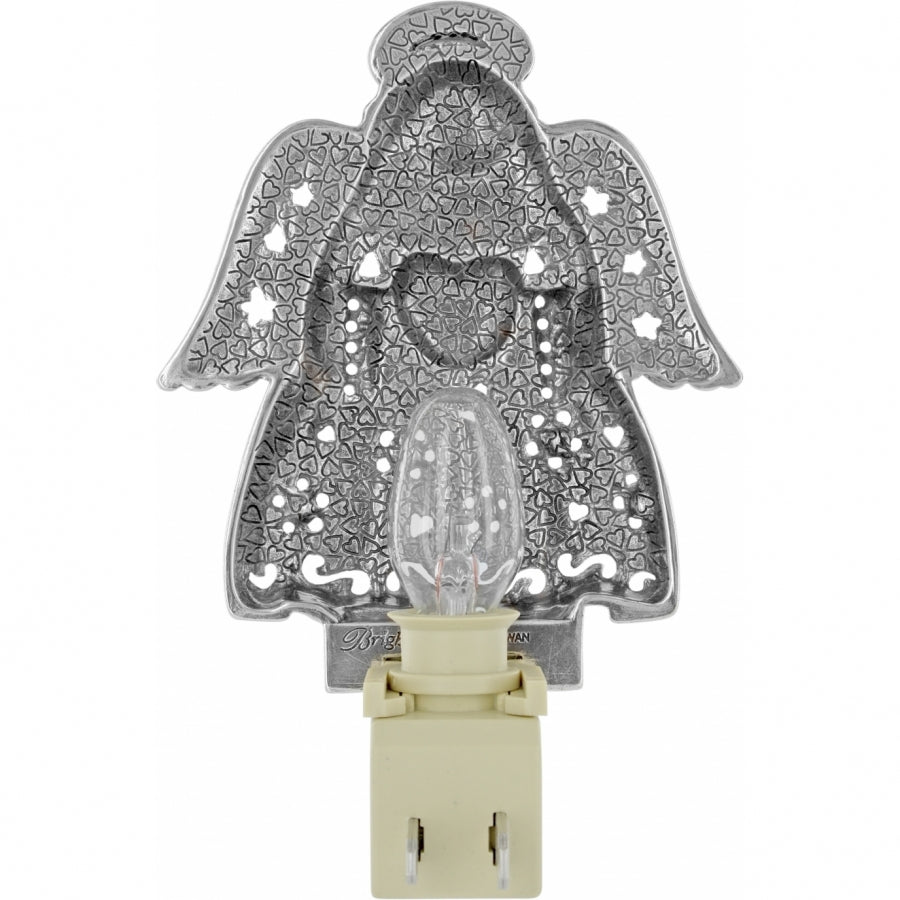 Silver plated Angel Heart night light with a glowing bulb inside.