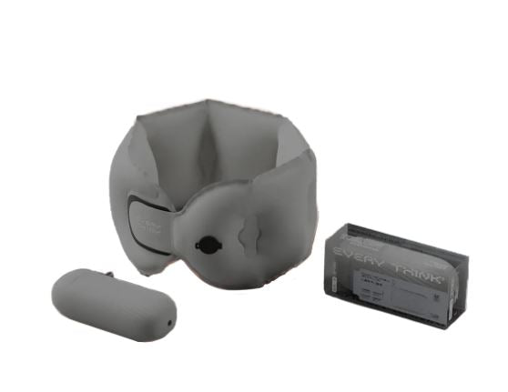 Dark gray self-inflating neck pillow with ergonomic support in a compact storage case.