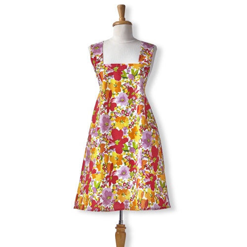 Springtime Floral Pinafore Apron with red, orange, and purple flowers on a white background.