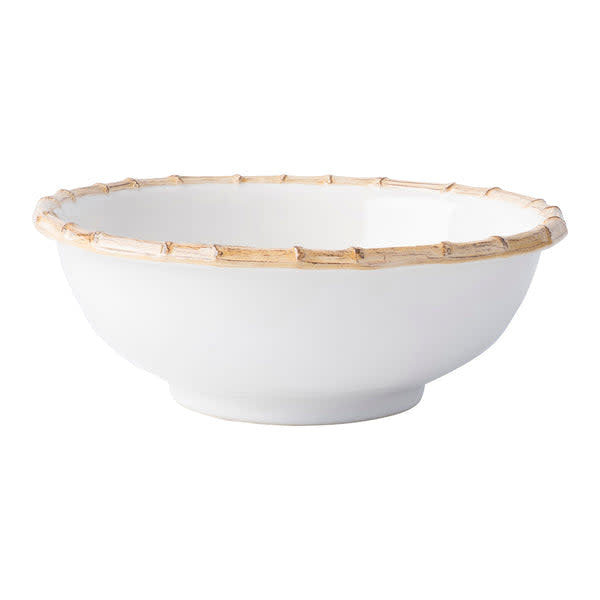 Natural ceramic serving bowl with an encircling traditional bamboo rim