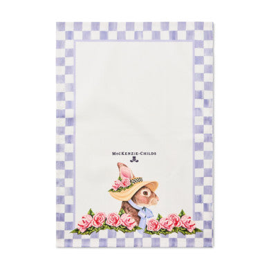 Cotton dish towel featuring a printed rabbit wearing a bonnet on an off-white background.
