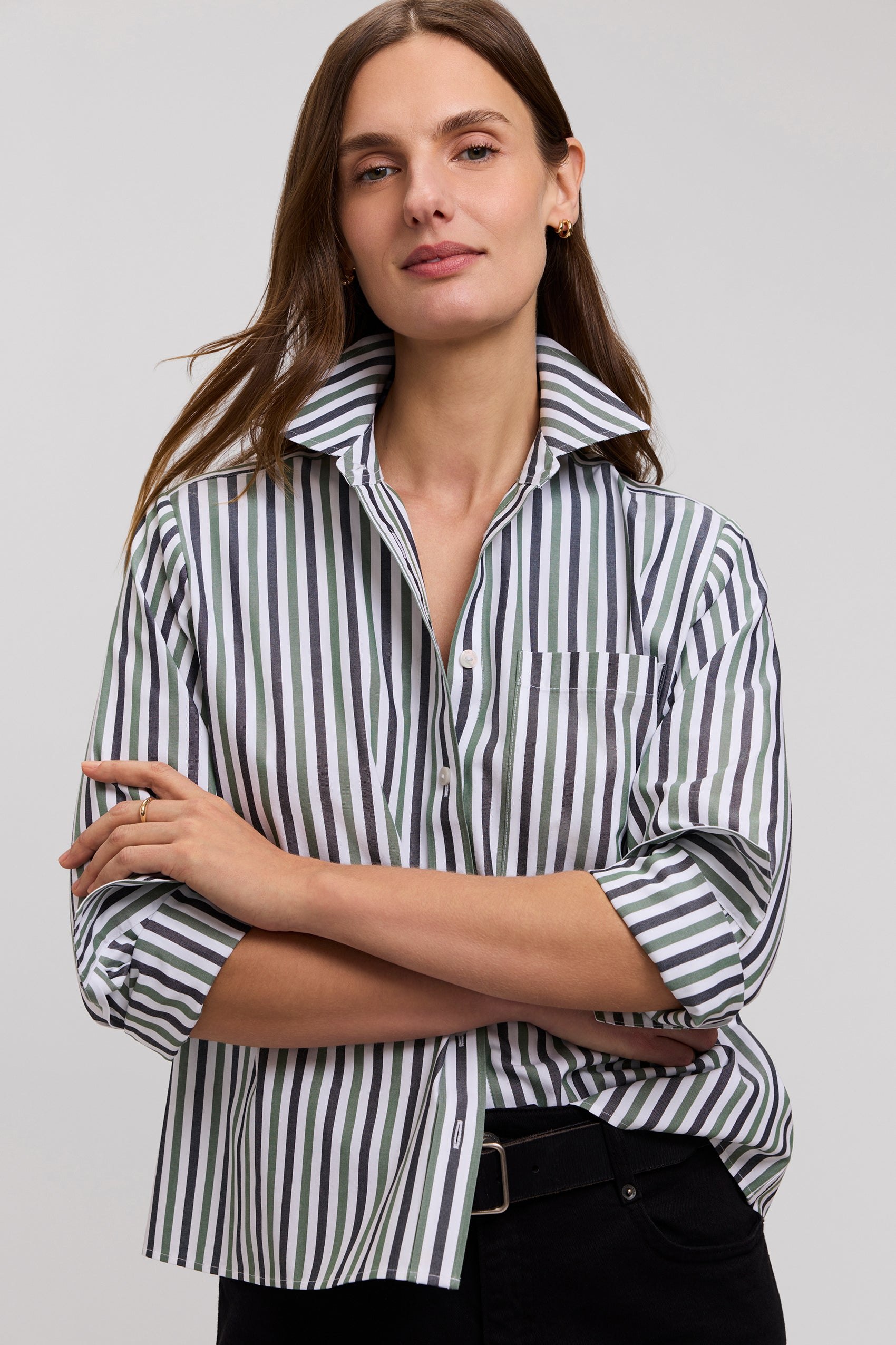 Woman wearing the Jodie No Iron Pinpoint Stripe Long Sleeve Short Shirt in a green and black stripe.