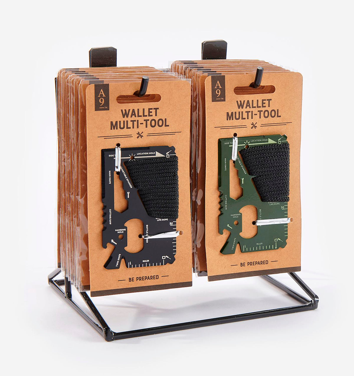Two stacks of multi-function wallet tools in black and green on a metal display stand.