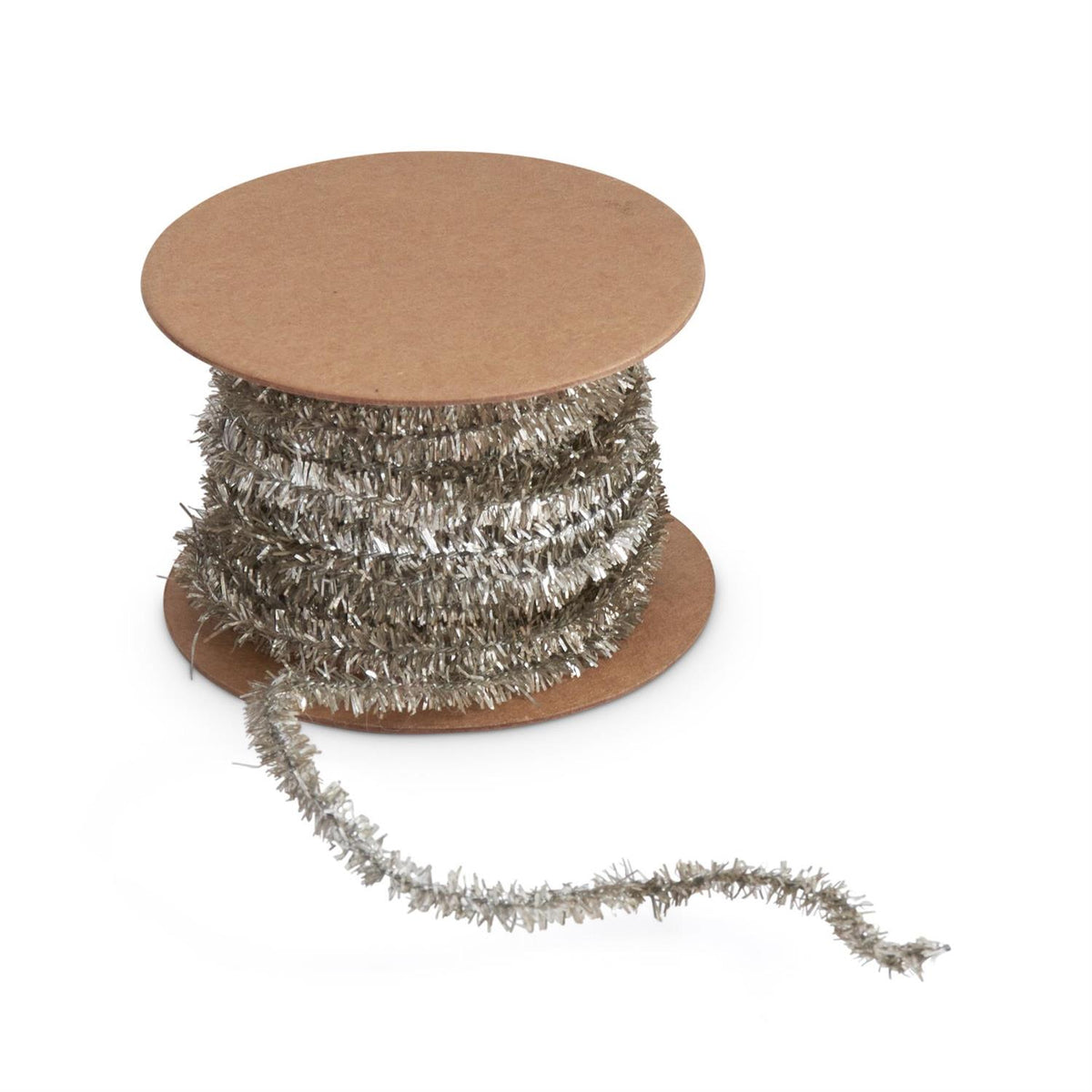 Silver tinsel garland ribbon on a spool with paper material.