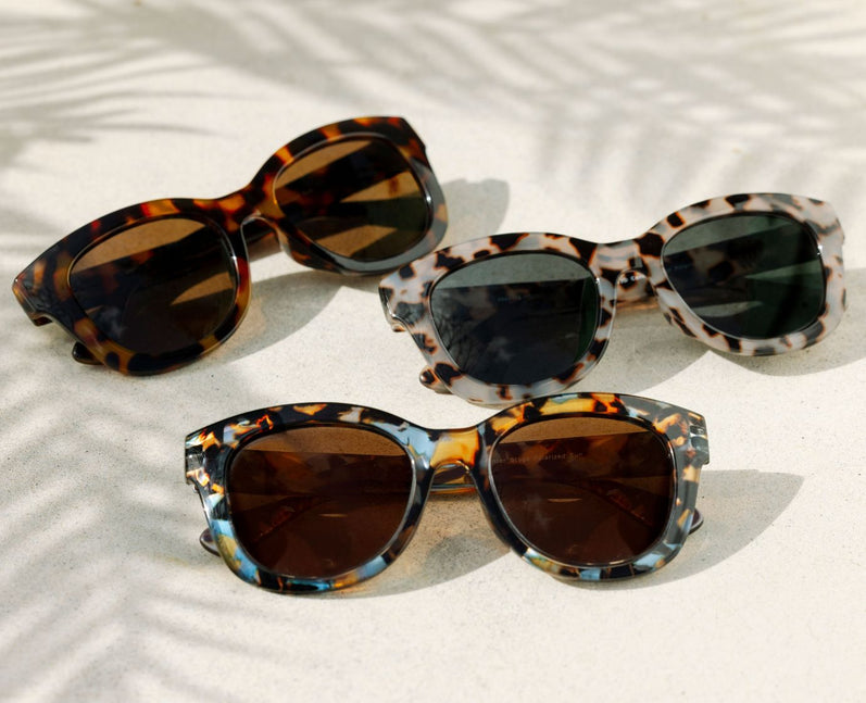 Center Stage Bifocal Sun sunglasses with recycled polycarbonate frames in black featuring polarized lenses and spring hinges.