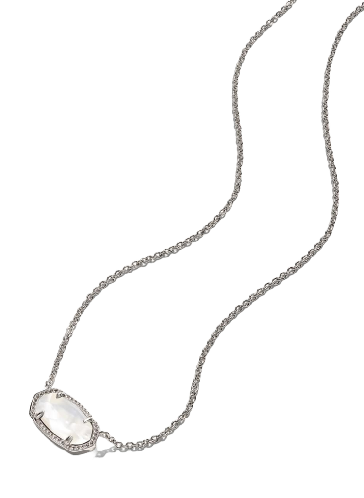 Elisa Luxe Short Pendant Necklace with a white stone and cubic zirconia on a silver chain.