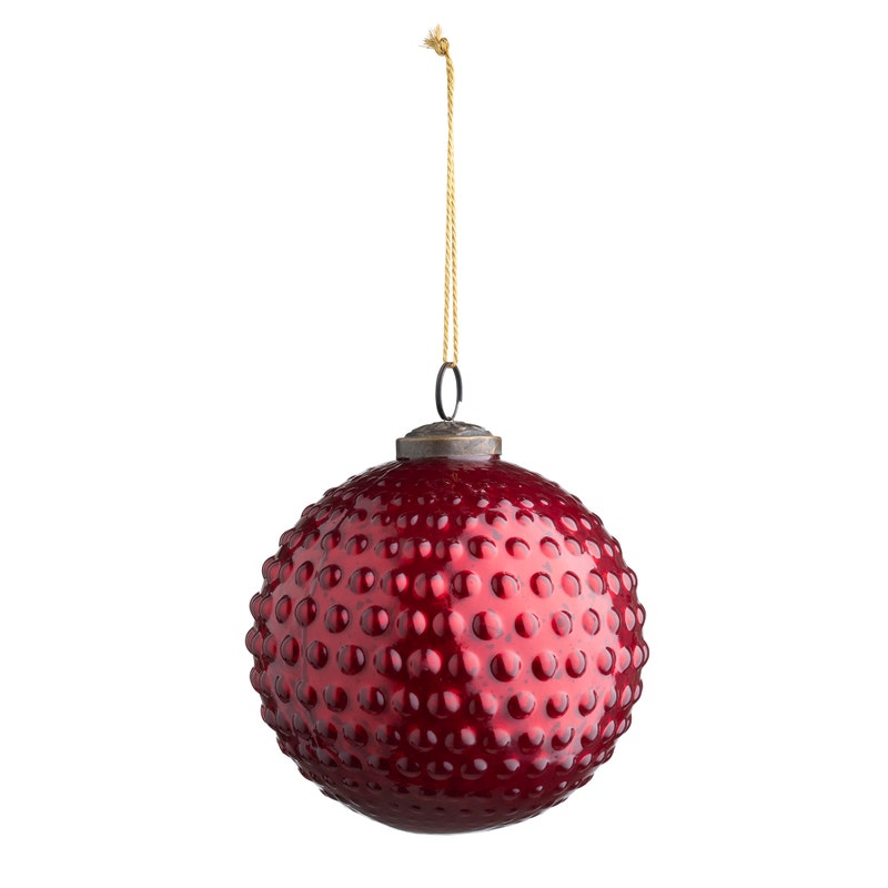 5-inch round ruby mercury glass ornament with a vintage hobnail texture and hanging string.