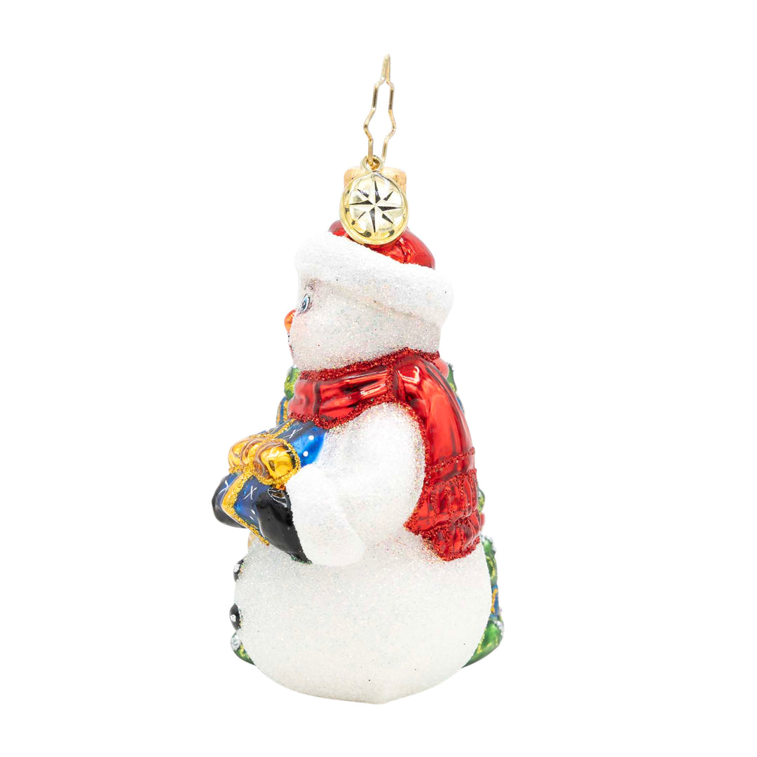 Snowy & Bright! Gem snowman ornament wearing a red scarf and hat, holding a blue gift box.