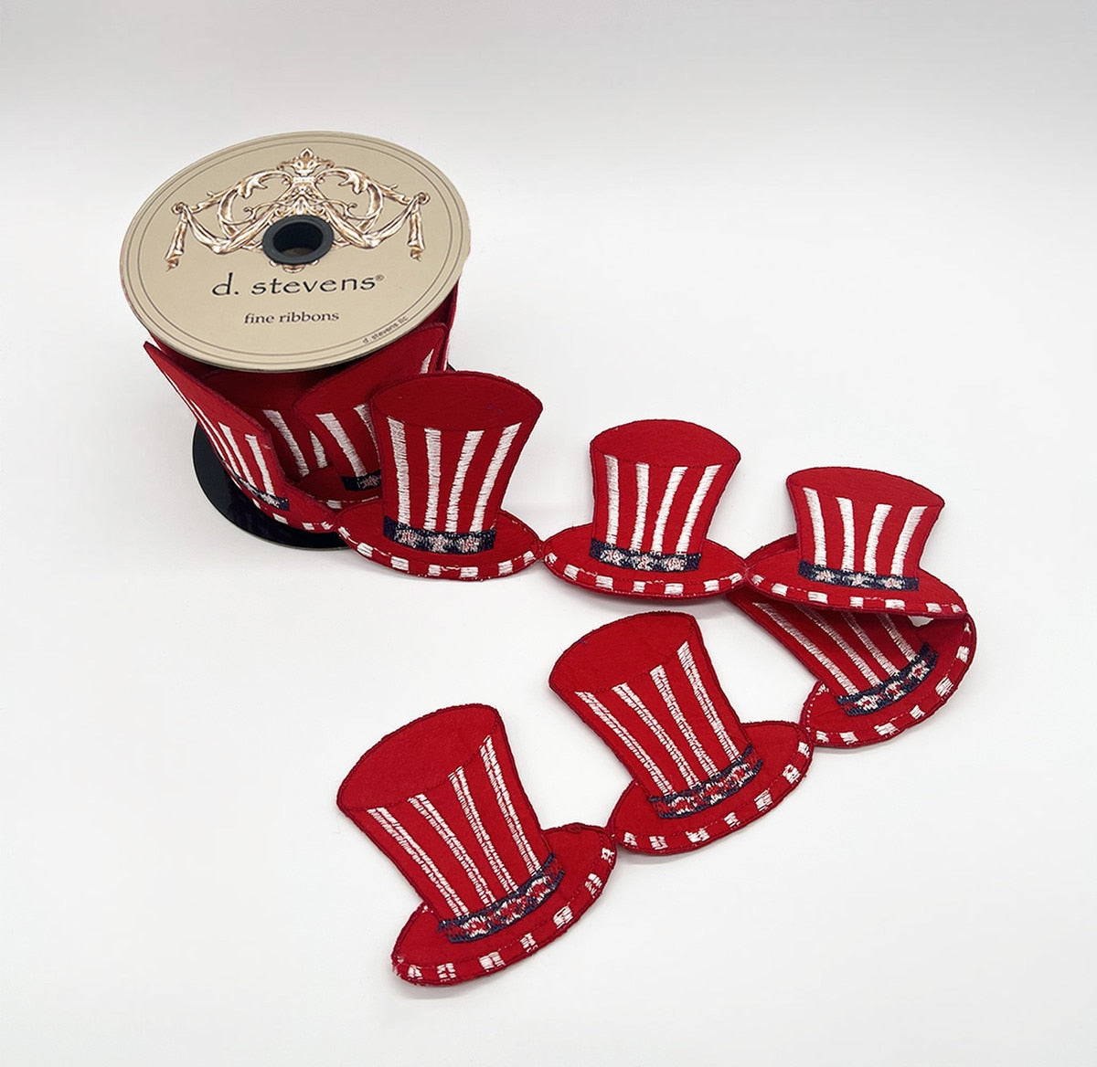 Red felt top hat garland with white and blue ribbon accents