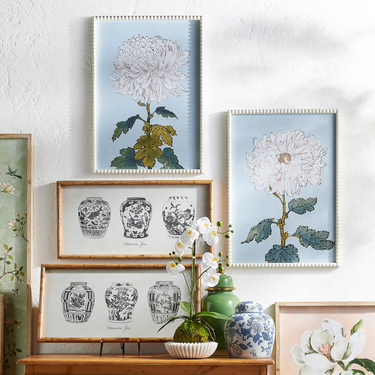Framed wall art featuring a black ginger jar on wood with dimensions 27 inches wide by 13.75 inches high.