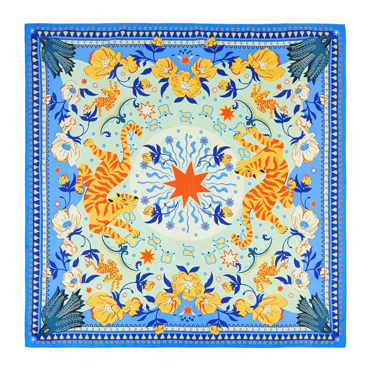 Mini square scarf with blue border, orange tigers, yellow flowers, and a central star design.