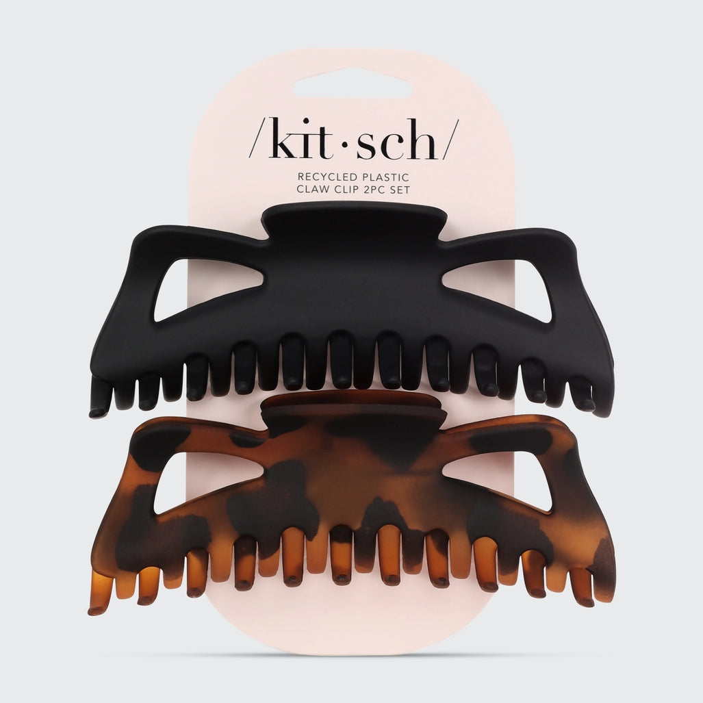 Two Kitsch jumbo classic claw clips in black and tortoise shell on a pink card.