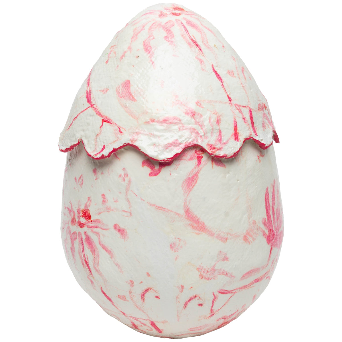 Pink scallop egg-shaped candle holder with chinoiserie floral patterns on a white ceramic surface.