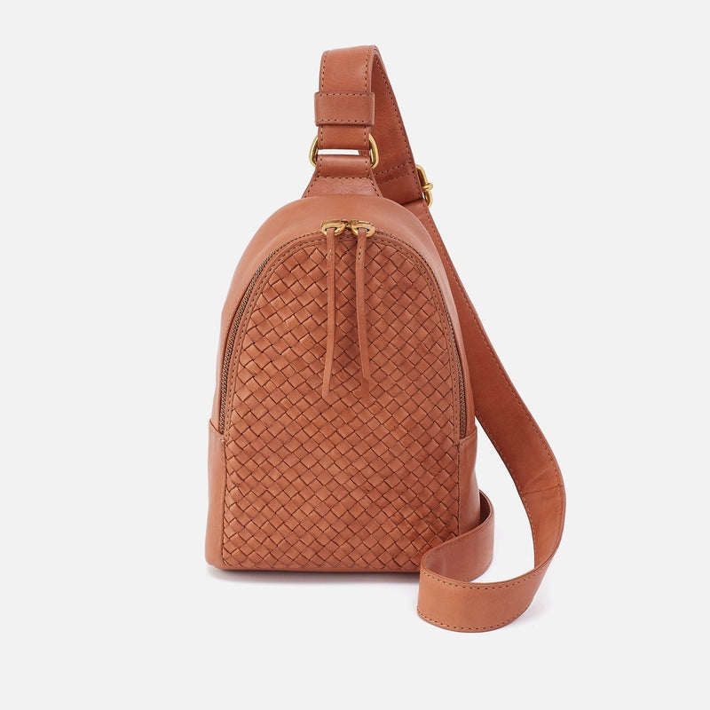 Harvest Wheat Fern Sling crossbody bag with pebbled leather strap and brushed brass hardware.