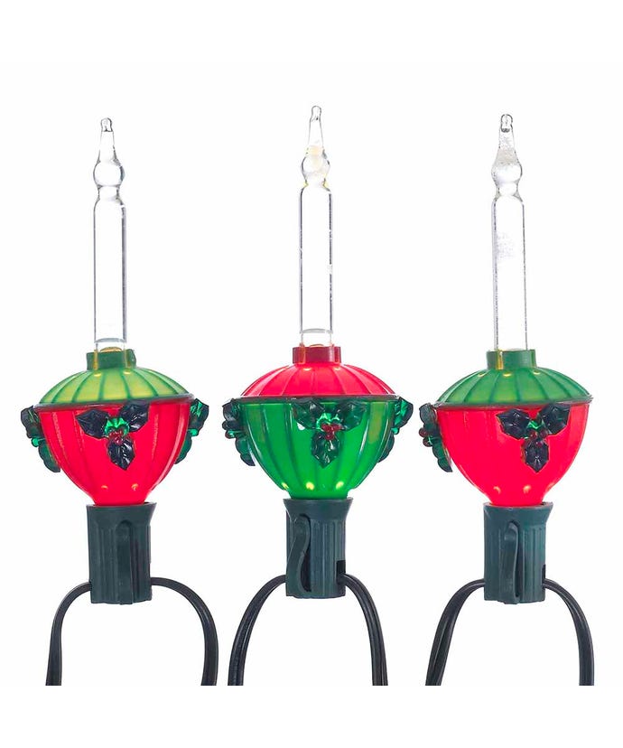 Three C7 bubble lights with red and green bases, holly leaf accents, and clear glass tubes.