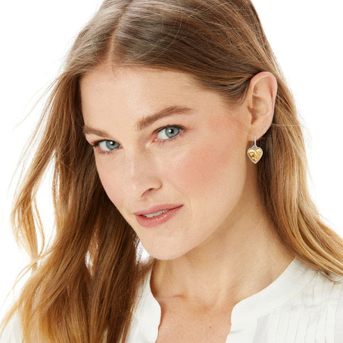 Silver-gold two-tone French wire earrings featuring fine quality crystal drops.