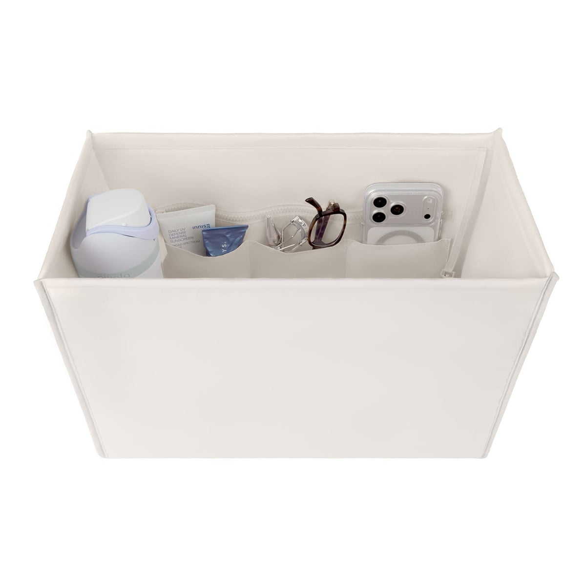 White structured tote organizer insert with compartments holding a water bottle, phone, and tools.