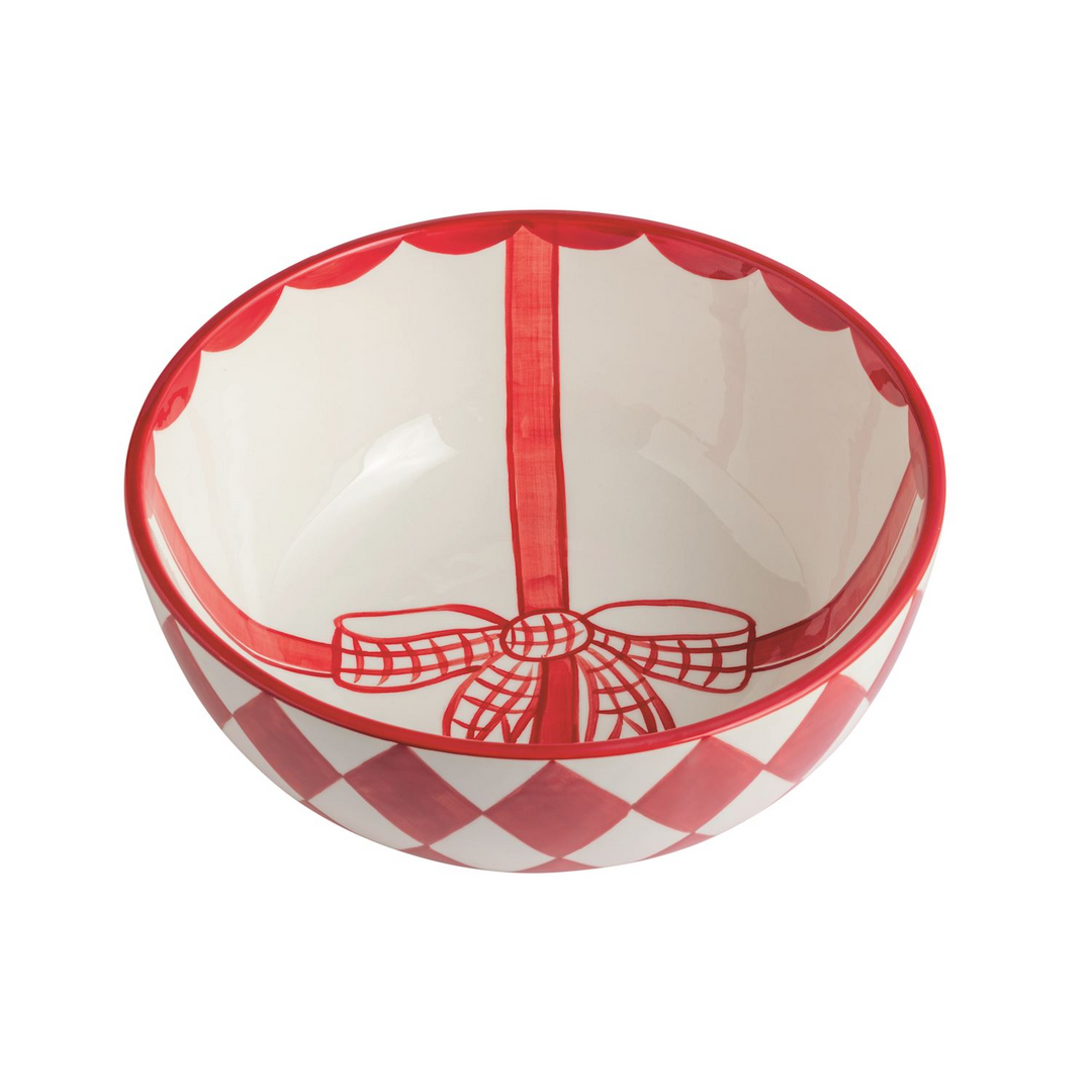 White ceramic bowl with red hand-painted ribbon, bow, and checkered pattern on the exterior.
