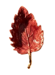 Red leaf-shaped tray with a glossy enamel finish, textured veins, and a gold metallic stem.